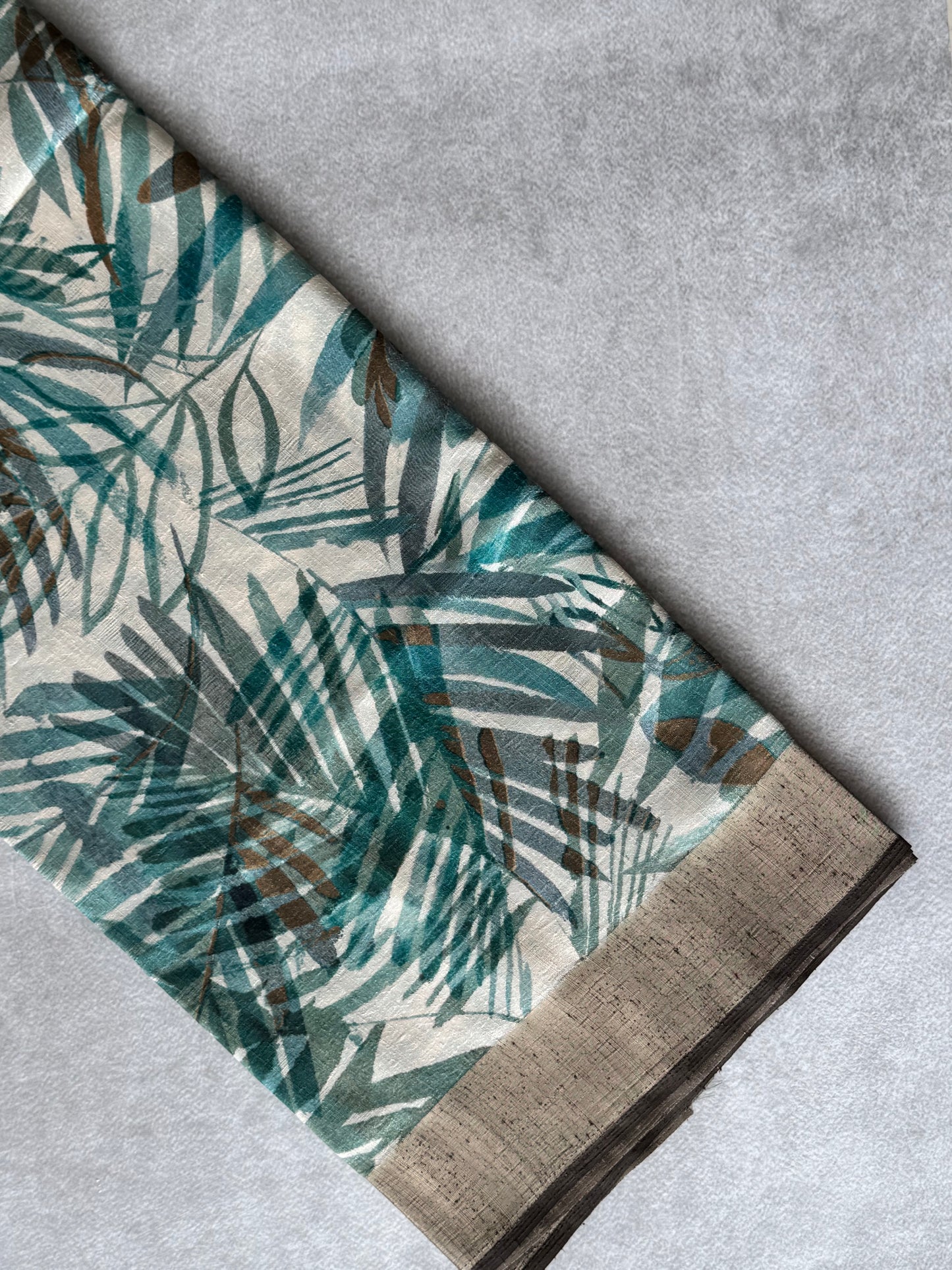 Pearl White Semi Tussar Saree with Teal & Green Florals